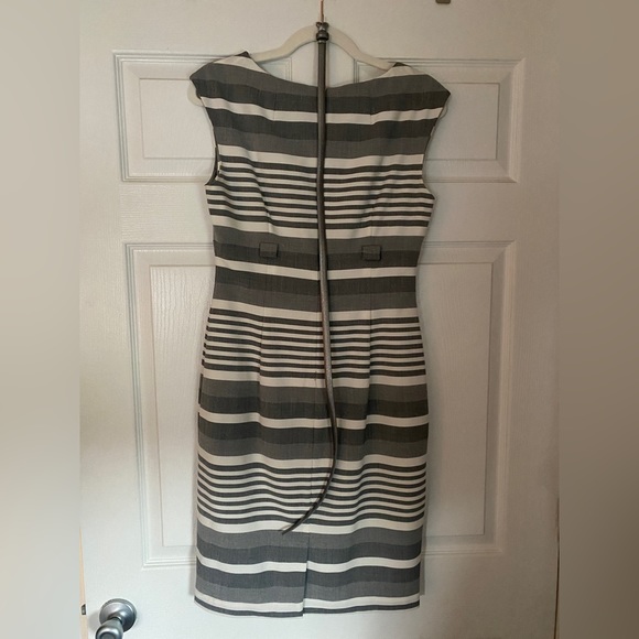 Knee length empire waist dress with belt to match. - Picture 2 of 3